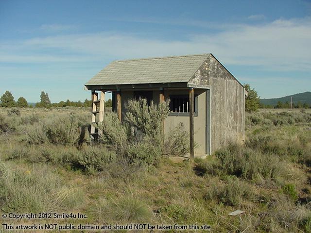 Mini saloon style cabin / shed that is on the property for sale in Nimrod River Park by Sprague River in Klamath County Oregon. Cute!